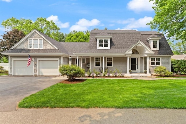 1 Bridge Ln, Newburyport, MA 01950 - shingle-style home with driveway, a front lawn, a shingled roof, and covered porch