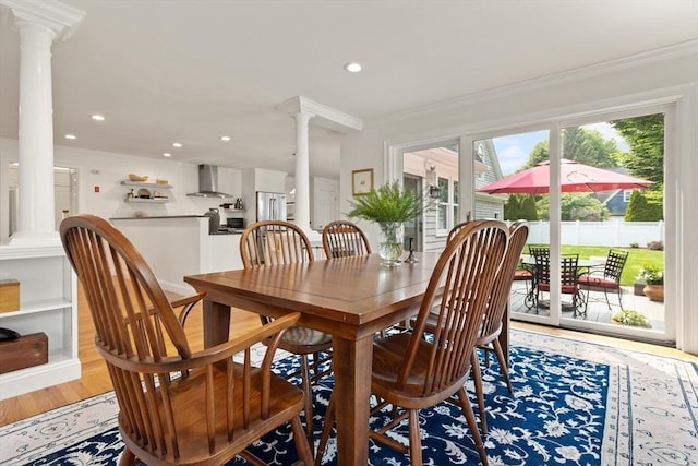 1 Bridge Ln, Newburyport, MA 01950 - dining area featuring decorative columns, crown molding, wood finished floors, and recessed lighting