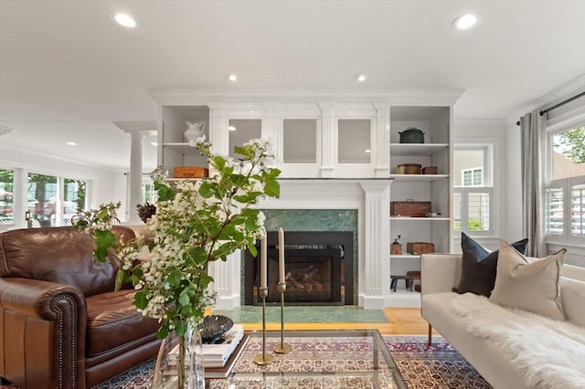 1 Bridge Ln, Newburyport, MA 01950 - living room with ornamental molding, recessed lighting, a fireplace with flush hearth, and light wood finished floors