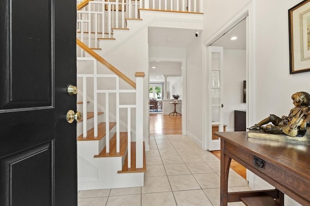 1 Bridge Ln, Newburyport, MA 01950 - foyer entrance with light tile patterned flooring and stairway