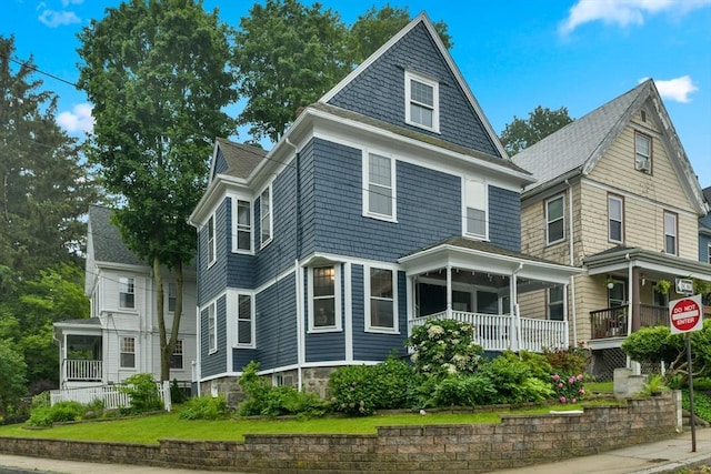 69 Dracut, Boston, MA 02124 - view of front facade featuring covered porch