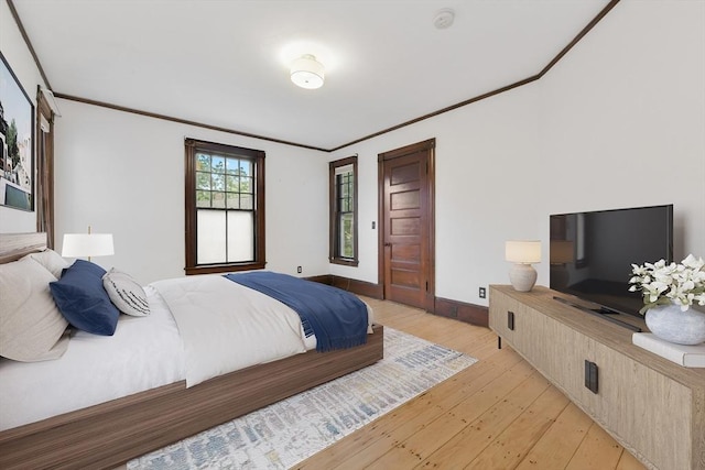 69 Dracut, Boston, MA 02124 - bedroom featuring light wood finished floors and crown molding