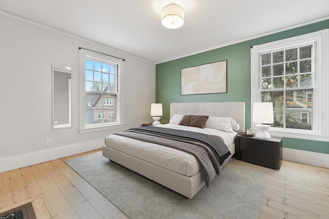 69 Dracut, Boston, MA 02124 - bedroom with ornamental molding and hardwood / wood-style floors