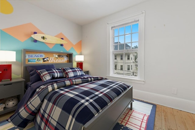69 Dracut, Boston, MA 02124 - bedroom featuring wood finished floors and baseboards