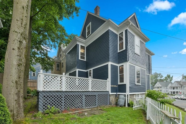 69 Dracut, Boston, MA 02124 - back of property with a chimney