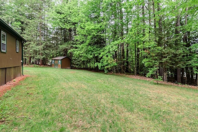32 Birch Rd, Goshen, MA 01032 - view of green lawn featuring a wooded view