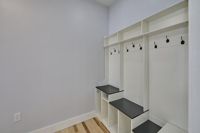 97 Oakton Ave, Boston, MA 02122 - mudroom featuring light wood-style floors and baseboards