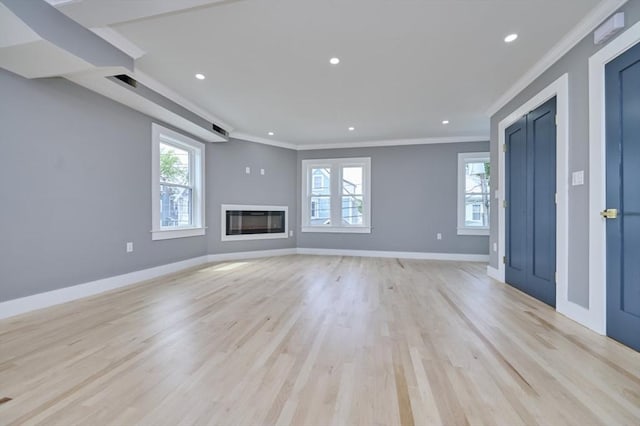 97 Oakton Ave, Boston, MA 02122 - unfurnished living room with ornamental molding, recessed lighting, light wood finished floors, baseboards, and a glass covered fireplace