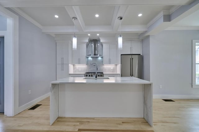 97 Oakton Ave, Boston, MA 02122 - kitchen with high end refrigerator, wall chimney range hood, a sink, white cabinets, and a large island with sink