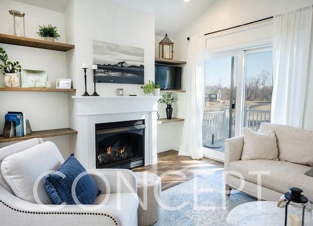 living room with vaulted ceiling and parquet flooring