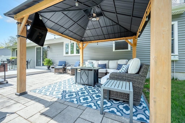 view of patio with an outdoor hangout area and a gazebo