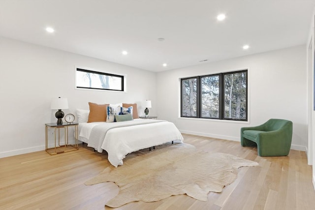 bedroom featuring light hardwood / wood-style floors