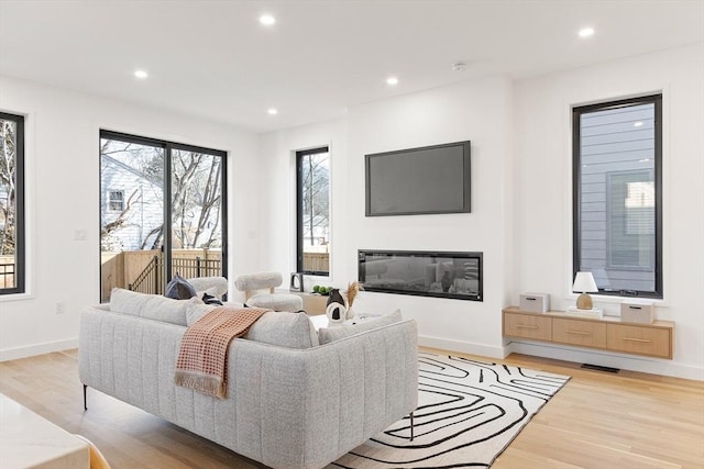 living room with light wood-type flooring