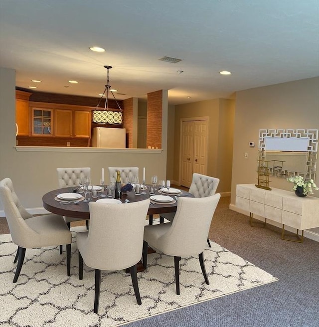 dining area with recessed lighting, visible vents, carpet flooring, and baseboards