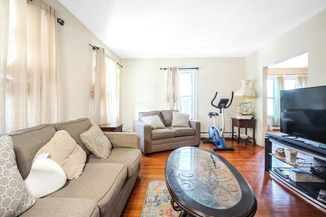 living room featuring dark hardwood / wood-style floors