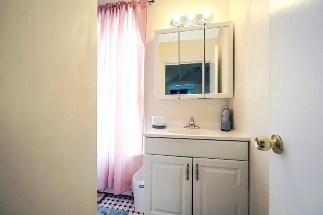 bathroom featuring tile patterned floors and vanity