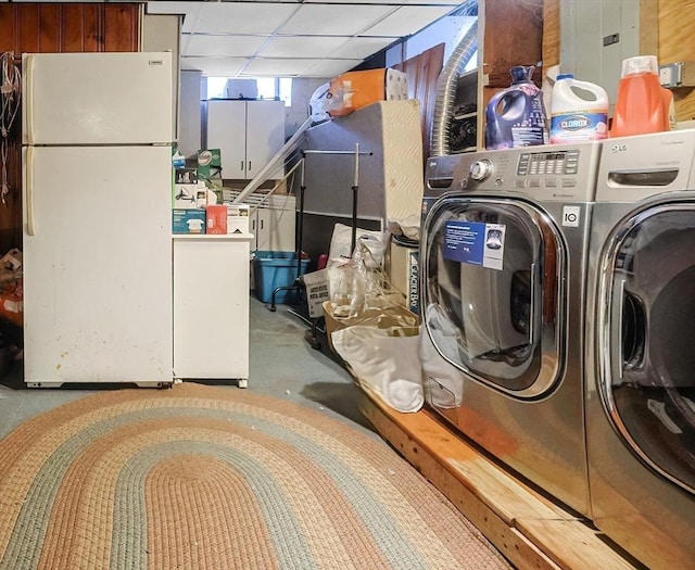 laundry room featuring separate washer and dryer