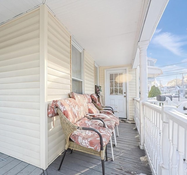 balcony featuring a porch