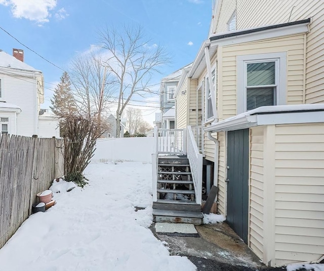 view of yard covered in snow