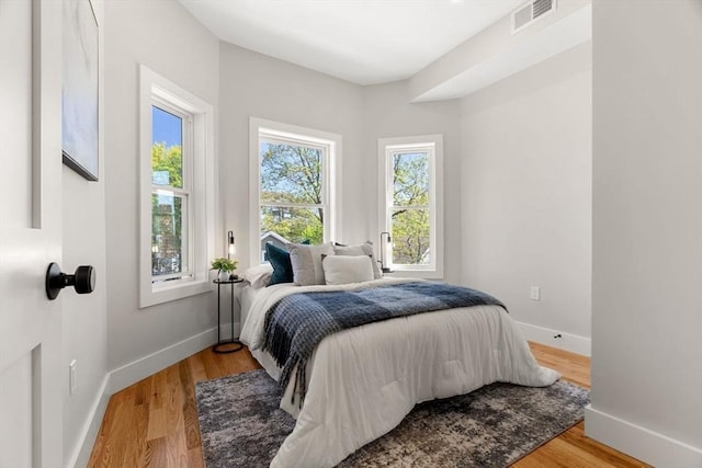 21 Ellington St Unit 2, Boston, MA 02121 - bedroom with baseboards and light wood-style floors