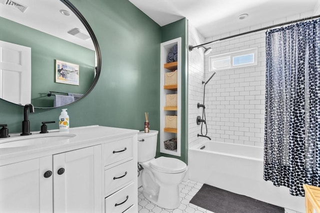 149-151 Pleasant St, Watertown, MA 02472 - full bath featuring vanity, toilet, shower / tub combo, and tile patterned flooring