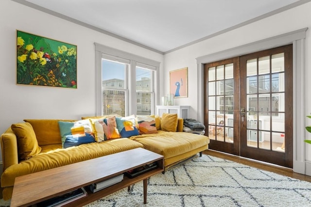 149-151 Pleasant St, Watertown, MA 02472 - living area with french doors, wood finished floors, and ornamental molding