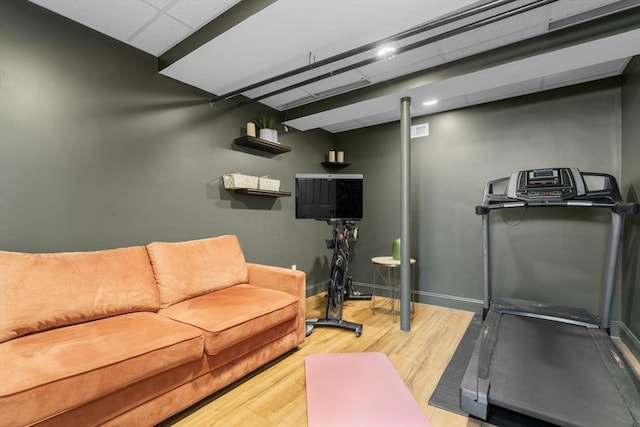 149-151 Pleasant St, Watertown, MA 02472 - workout room featuring wood finished floors, baseboards, and a paneled ceiling