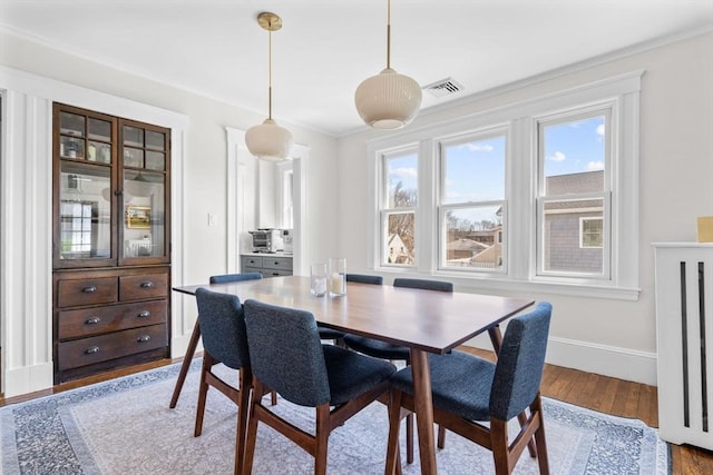 149-151 Pleasant St, Watertown, MA 02472 - dining area featuring wood finished floors and baseboards