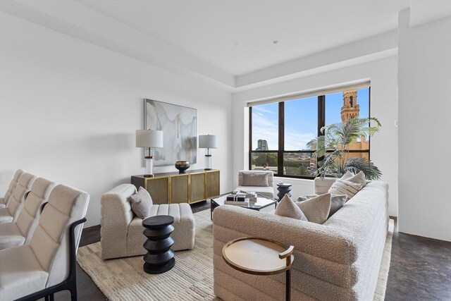 living room featuring concrete floors