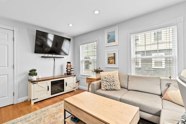 13 Emmet St Unit 1, Boston, MA 02127 - living room featuring light wood-style floors, recessed lighting, and baseboards
