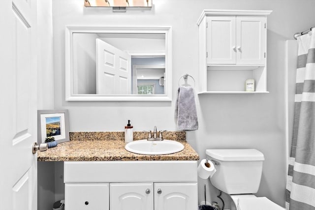 13 Emmet St Unit 1, Boston, MA 02127 - full bath with vanity, toilet, and curtained shower
