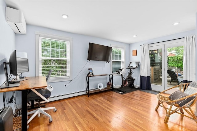13 Emmet St Unit 1, Boston, MA 02127 - office space featuring a wall mounted AC, light wood-type flooring, recessed lighting, and baseboard heating