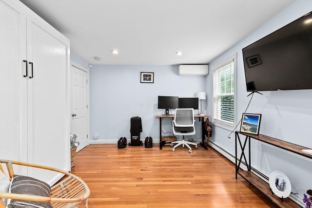 13 Emmet St Unit 1, Boston, MA 02127 - office area with a wall unit AC, light wood-style flooring, baseboards, and recessed lighting
