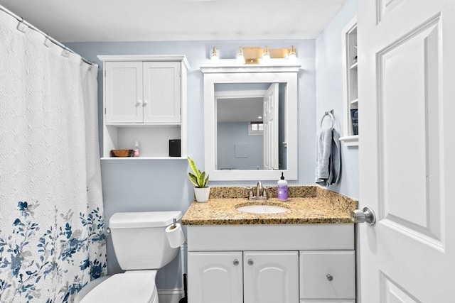 13 Emmet St Unit 1, Boston, MA 02127 - bathroom featuring vanity, toilet, and curtained shower