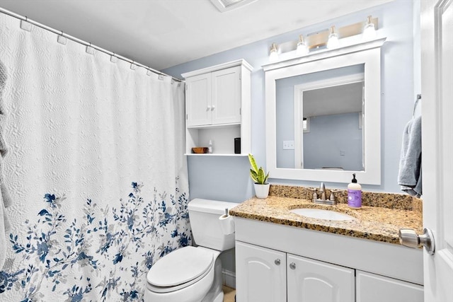 13 Emmet St Unit 1, Boston, MA 02127 - full bath featuring toilet, vanity, and a shower with shower curtain