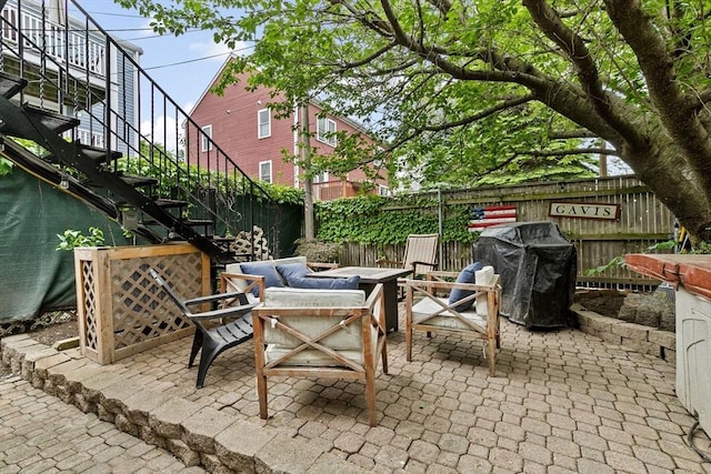 13 Emmet St Unit 1, Boston, MA 02127 - view of patio / terrace with stairway and an outdoor fire pit