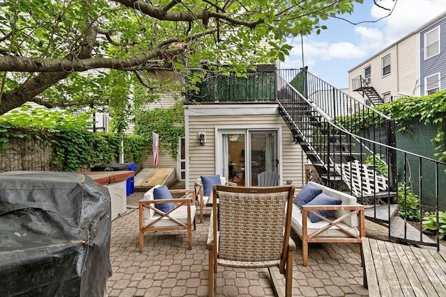 13 Emmet St Unit 1, Boston, MA 02127 - view of patio / terrace with stairs, an outdoor living space, a wooden deck, and a grill