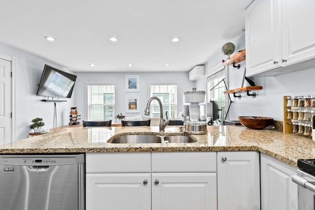 13 Emmet St Unit 1, Boston, MA 02127 - kitchen featuring dishwasher, a sink, white cabinets, light stone counters, and recessed lighting