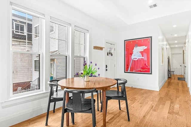 239 Lexington St Unit 2, Boston, MA 02128 - dining space with light wood-style floors and recessed lighting
