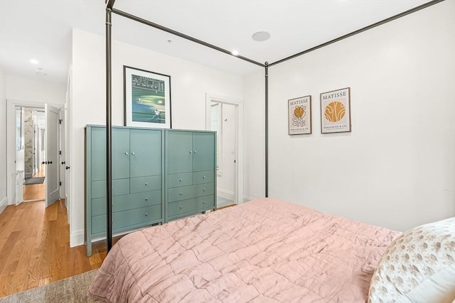 239 Lexington St Unit 2, Boston, MA 02128 - bedroom with wood finished floors and recessed lighting