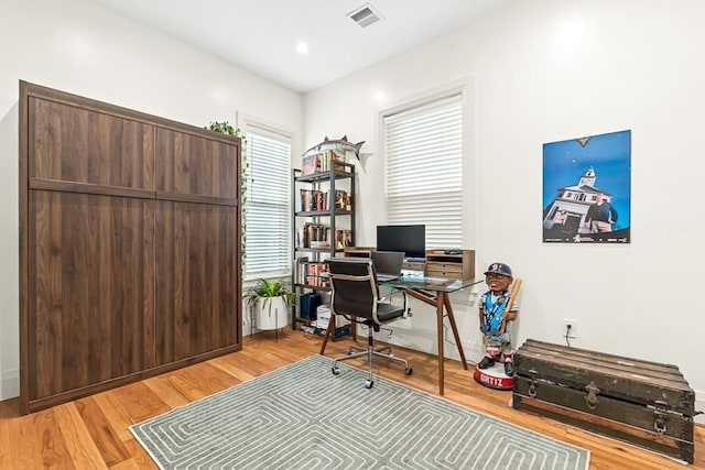 239 Lexington St Unit 2, Boston, MA 02128 - office area with light wood-style floors and baseboards