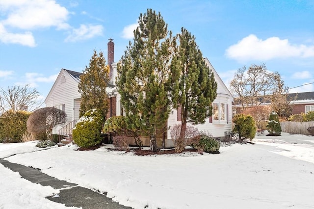 view of snow covered property