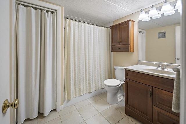 993 Massachusetts Ave Unit 127, Arlington, MA 02476 - bathroom with toilet, vanity, tile patterned floors, a textured ceiling, and shower / bathtub combination with curtain
