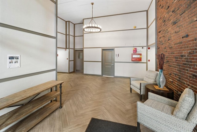 993 Massachusetts Ave Unit 127, Arlington, MA 02476 - community lobby with brick wall and a towering ceiling