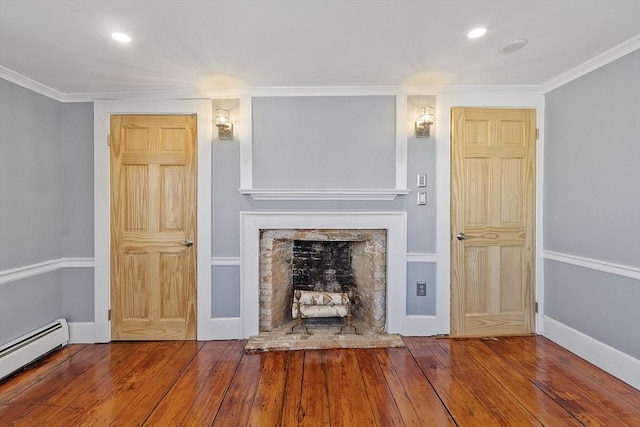 unfurnished living room with ornamental molding, a fireplace, a baseboard heating unit, and hardwood / wood-style flooring