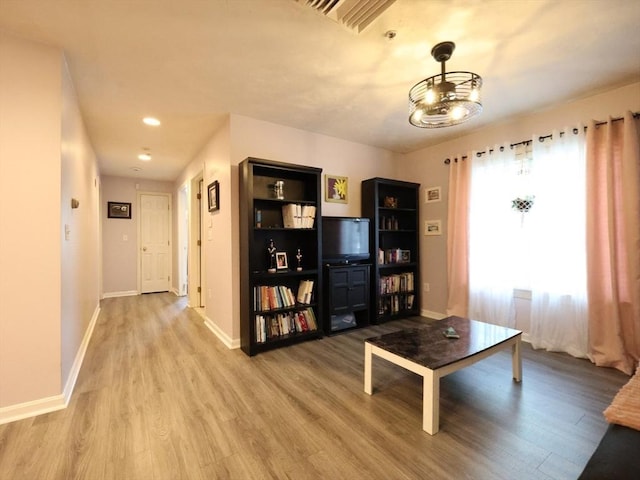 234 Water St Unit 101, Wakefield, MA 01880 - living area with wood finished floors and recessed lighting