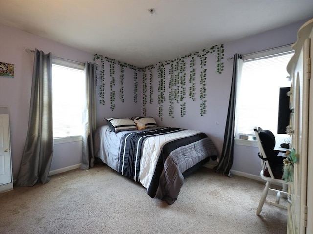 234 Water St Unit 101, Wakefield, MA 01880 - bedroom with light colored carpet and a desk