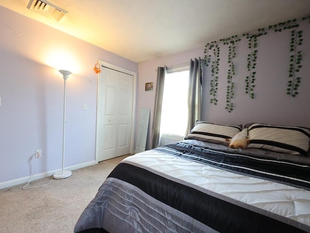 234 Water St Unit 101, Wakefield, MA 01880 - bedroom with light carpet and a closet