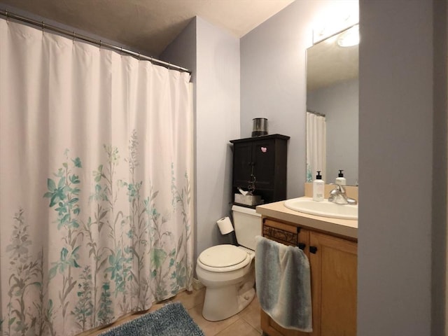 234 Water St Unit 101, Wakefield, MA 01880 - full bathroom featuring tile patterned floors, vanity, and a shower with curtain