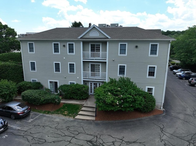 234 Water St Unit 101, Wakefield, MA 01880 - view of building exterior featuring uncovered parking